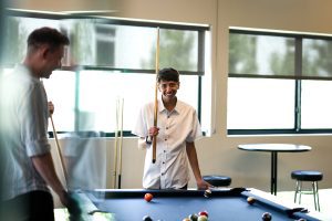 Scott and Xavier playing pool